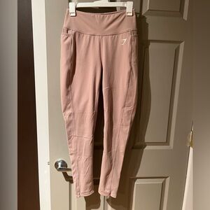 Gymshark workout pants. Very soft. Side pockets. Size M. Like new. Taupe color.